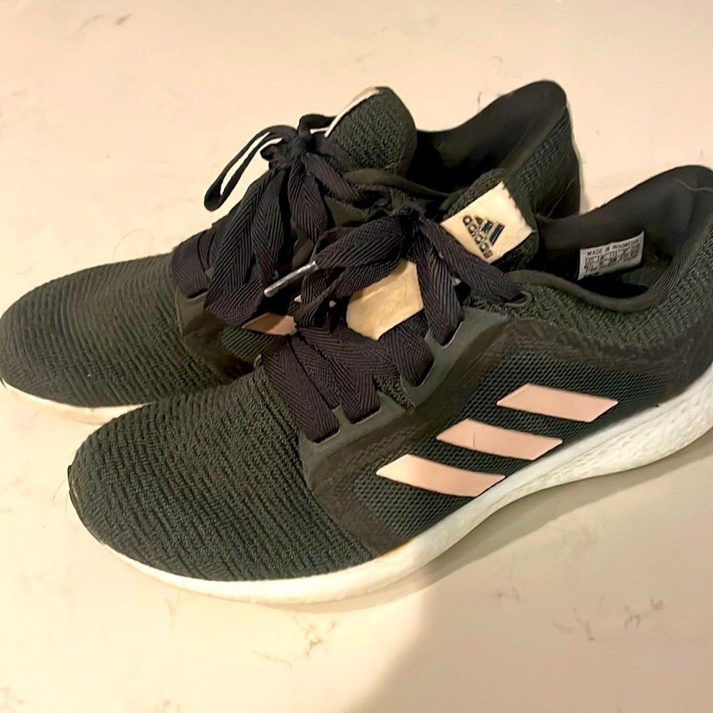 Pair of Olive Green and Pale Pink Adidas shoes